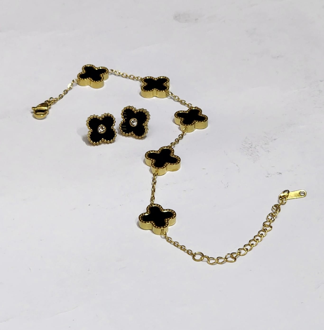 `Elegant Black Clover Bracelet & Stud Earrings Set - Gold Plated